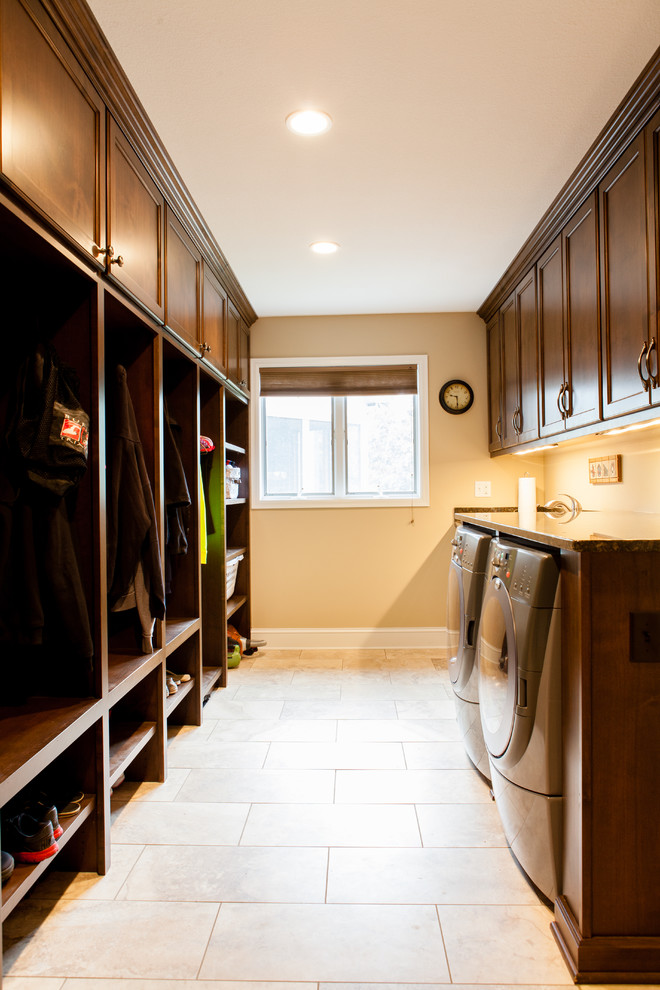 Design ideas for a medium sized classic galley utility room in Minneapolis with a submerged sink, flat-panel cabinets, medium wood cabinets, granite worktops, beige walls, ceramic flooring and a side by side washer and dryer.