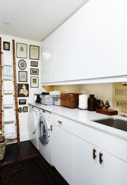 Example of an eclectic laundry room design in Toronto