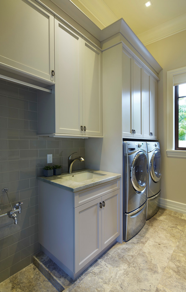 Inspiration for a mediterranean laundry room remodel in Miami