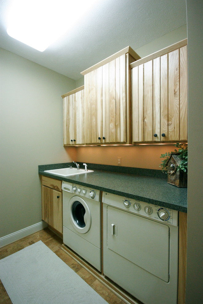 Example of an arts and crafts laundry room design in Detroit