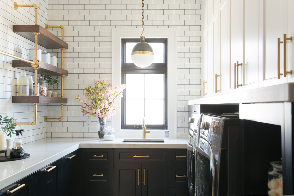 Design ideas for a traditional u-shaped separated utility room in Salt Lake City with a submerged sink, shaker cabinets, black cabinets, white walls, a side by side washer and dryer and white worktops.