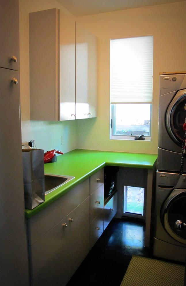 Photo of a contemporary utility room in Austin with green worktops.