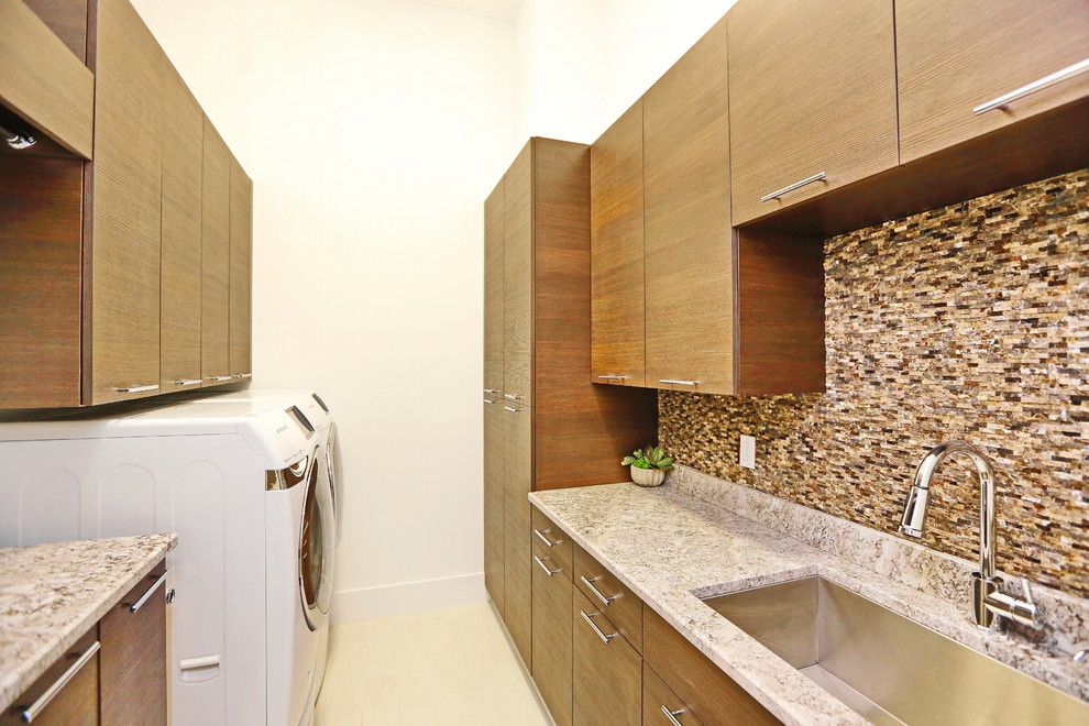 Example of a trendy laundry room design in Tampa
