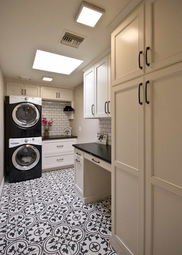 Example of a transitional laundry room design in Phoenix