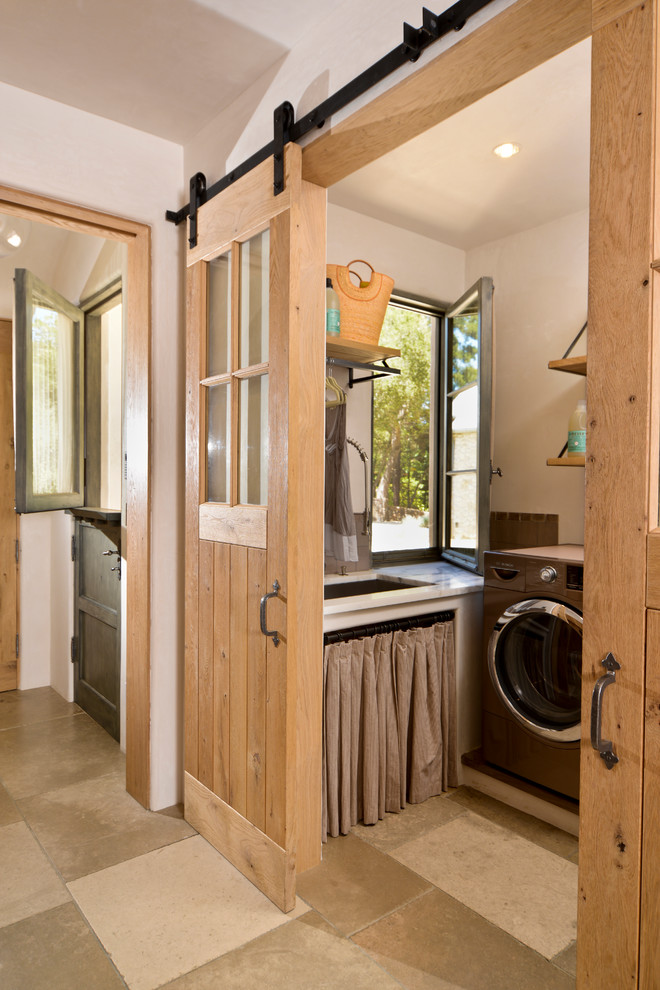 Inspiration for a mediterranean dedicated laundry room remodel in San Francisco
