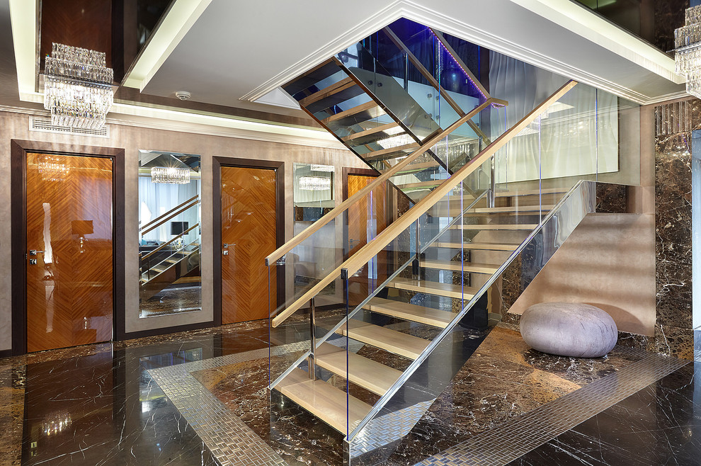 Стильный дизайн: п-образная лестница в современном стиле с деревянными ступенями без подступенок - последний тренд