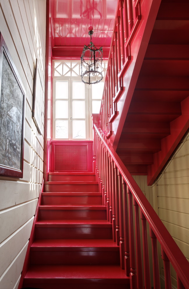 Cette photo montre un escalier peint éclectique en U de taille moyenne avec des marches en bois peint.