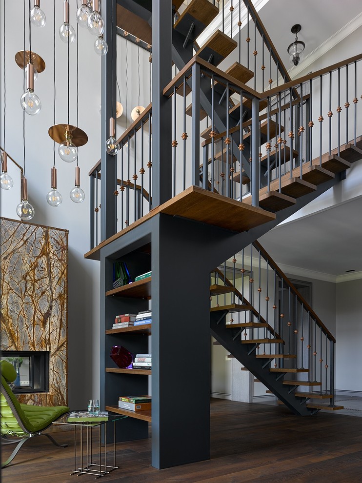 Contemporary wood u-shaped staircase in Moscow with open risers.