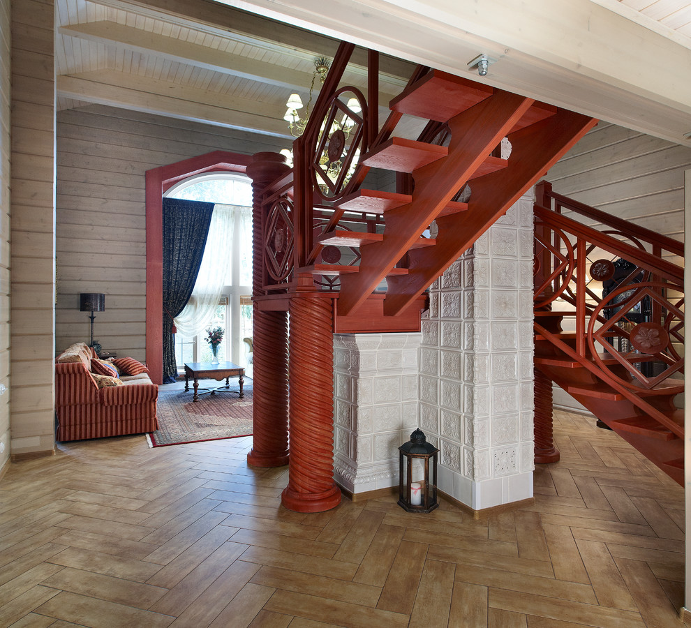 Свежая идея для дизайна: п-образная лестница среднего размера в стиле кантри с деревянными ступенями без подступенок - отличное фото интерьера