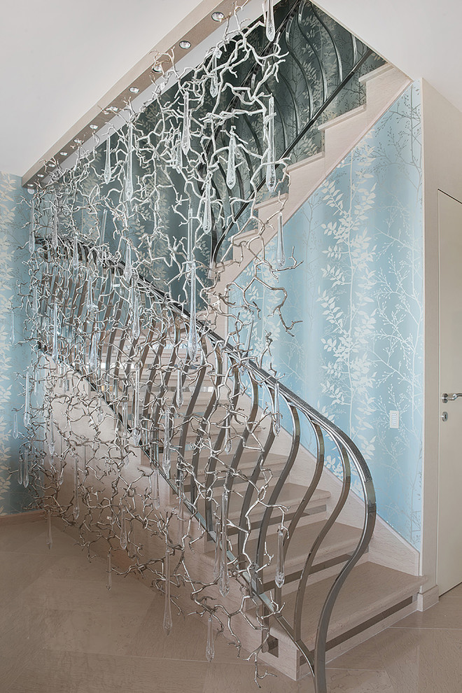 Photo of a contemporary u-shaped metal railing staircase in Moscow.