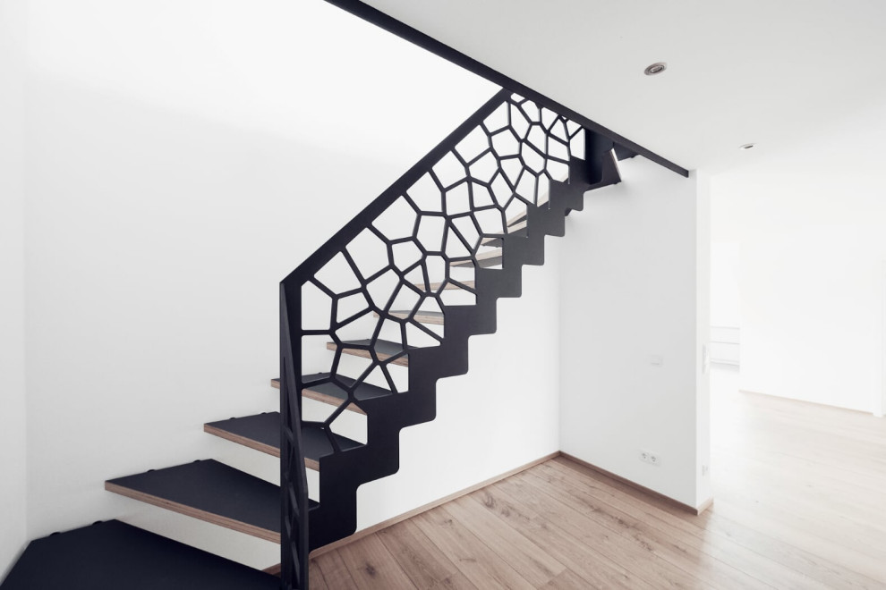 Источник вдохновения для домашнего уюта: лестница в современном стиле с деревянными ступенями и деревянными перилами