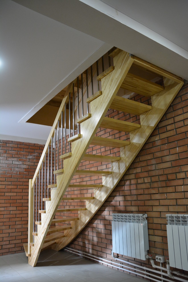 Medium sized industrial wood l-shaped mixed railing staircase in Other with wood risers.