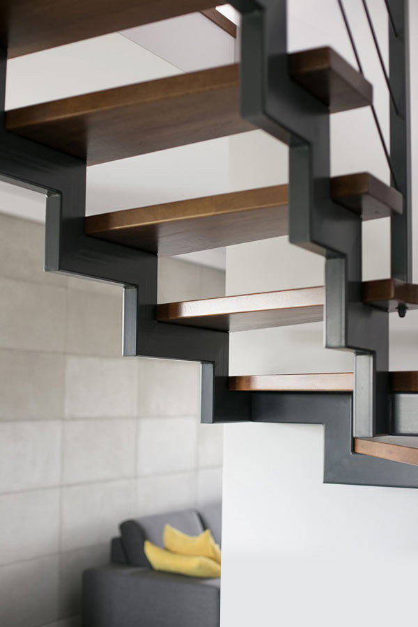 Inspiration for a mid-sized scandinavian painted l-shaped open, metal railing and wallpaper staircase remodel in Moscow