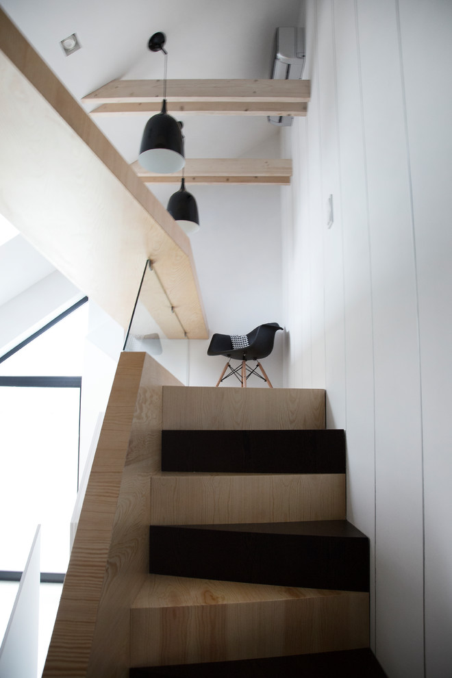Inspiration for a mid-sized contemporary wooden straight wood railing staircase remodel in Moscow