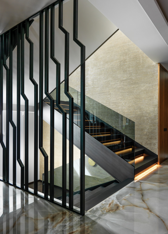 Contemporary u-shaped glass railing staircase in Moscow.