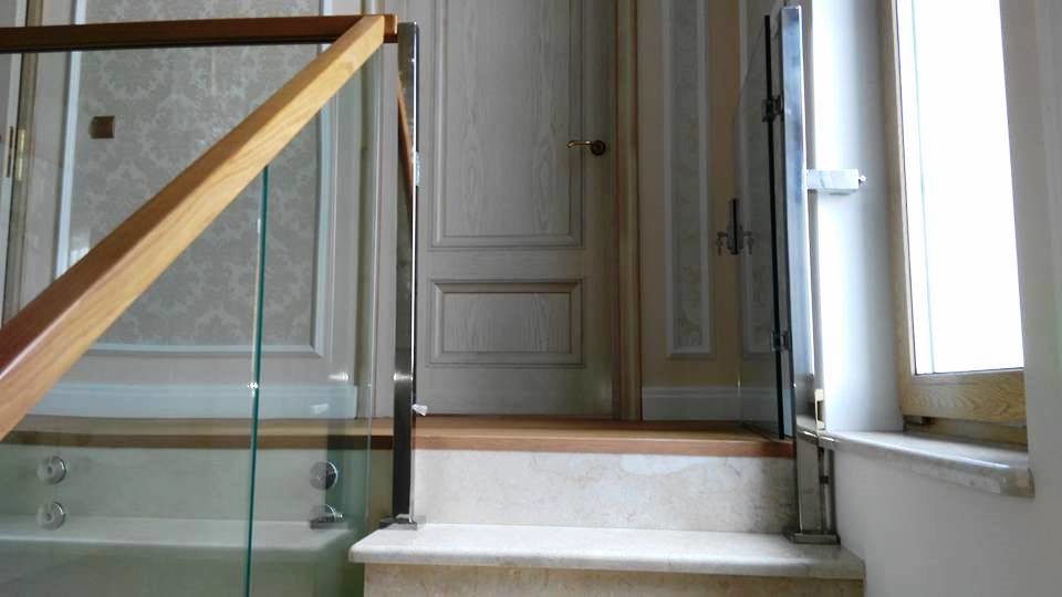 Inspiration for a contemporary glass railing staircase in Moscow.