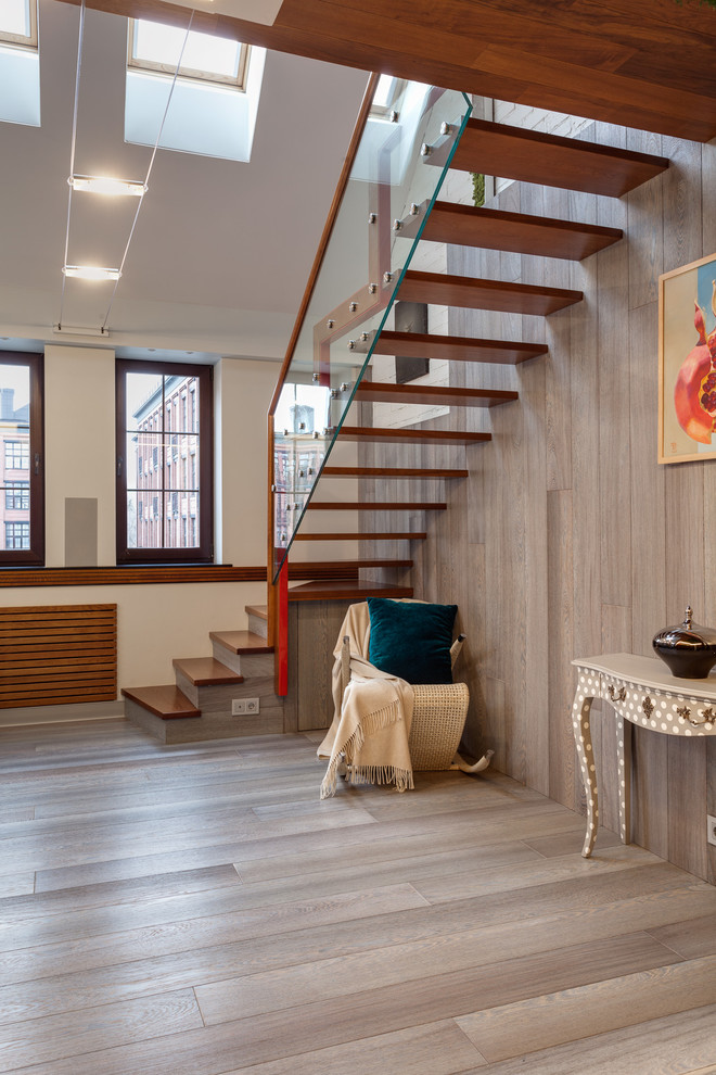 Источник вдохновения для домашнего уюта: угловая лестница среднего размера в стиле лофт с деревянными ступенями и перилами из смешанных материалов без подступенок