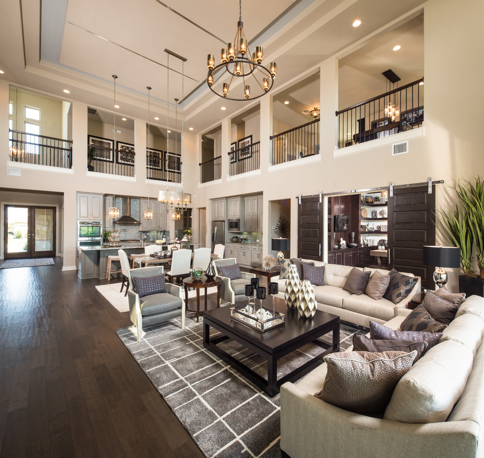 Design ideas for a classic formal open plan living room in Austin with beige walls and dark hardwood flooring.