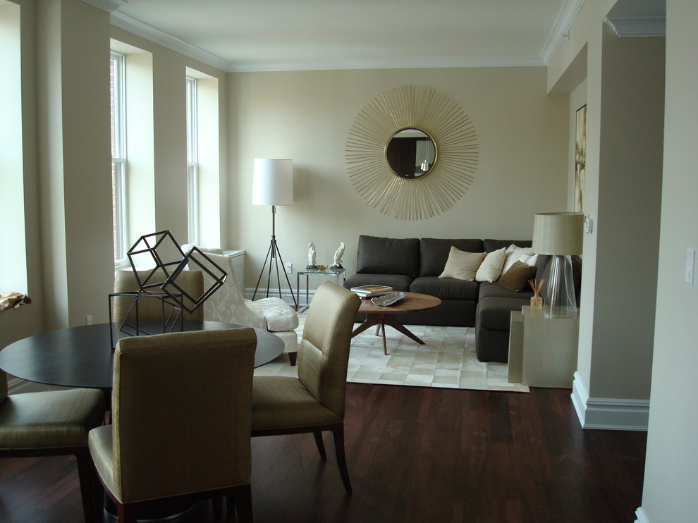 Example of a mid-sized transitional living room design in New York with beige walls