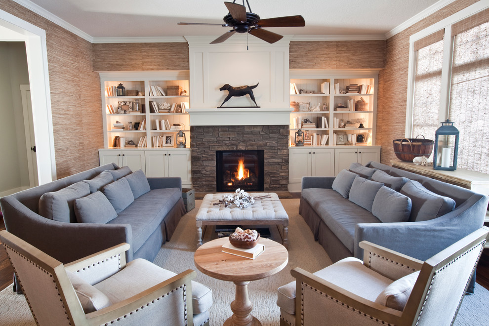 Inspiration for a large coastal living room library remodel in Other with beige walls and no tv