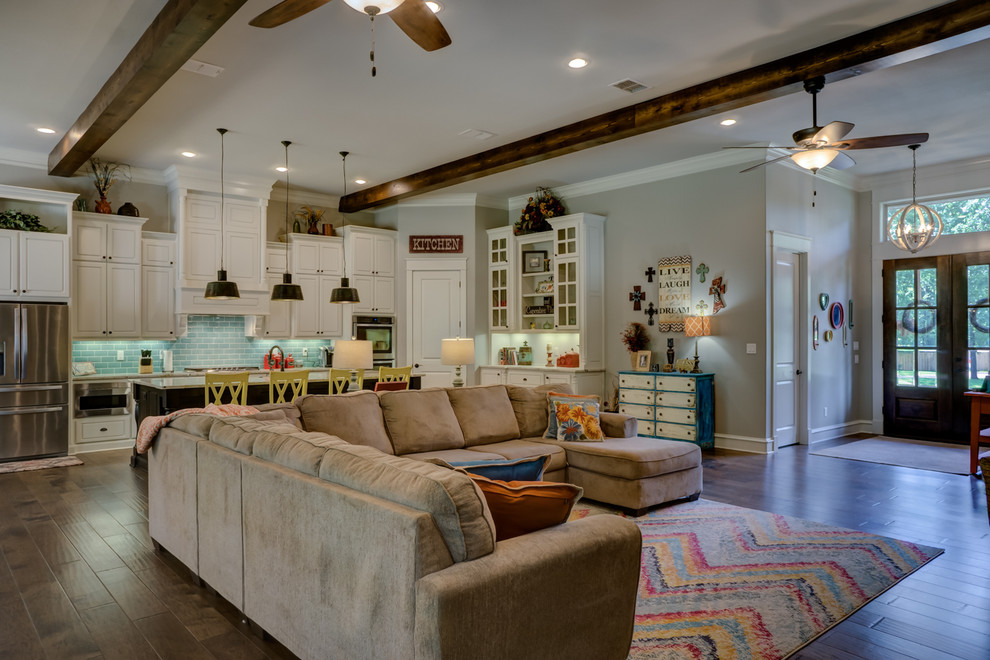 Design ideas for a country open plan living room in Austin with no fireplace.