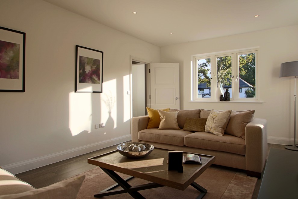 Example of a large trendy formal and enclosed dark wood floor living room design in Other with white walls, no fireplace and no tv