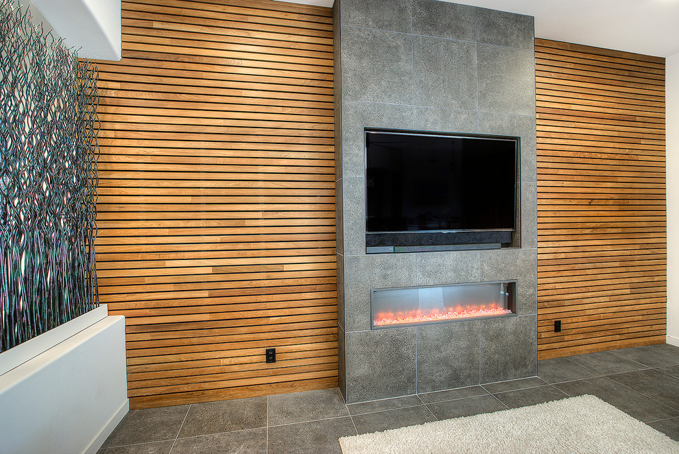 Inspiration for a medium sized modern formal open plan living room in Phoenix with brown walls, a ribbon fireplace, a tiled fireplace surround, a built-in media unit and grey floors.