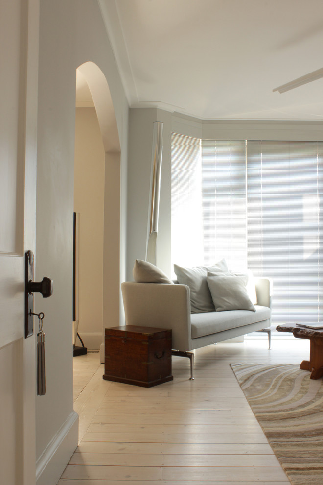 Стильный дизайн: гостиная комната в стиле фьюжн - последний тренд