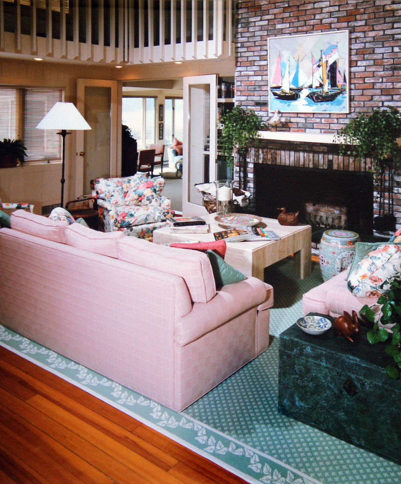 Medium sized classic open plan living room in Boston with beige walls, medium hardwood flooring, a standard fireplace and a brick fireplace surround.