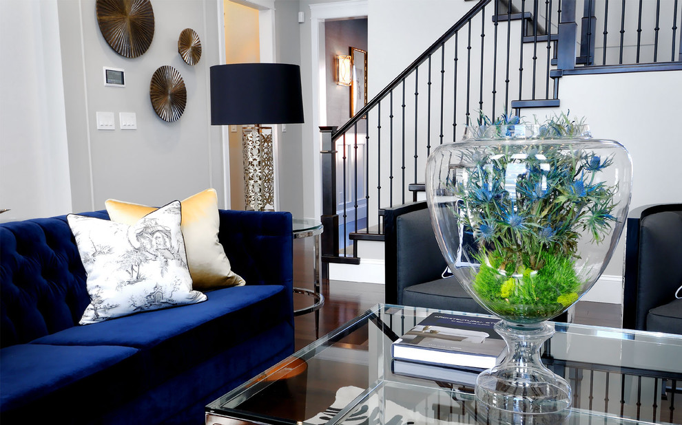 Example of a trendy dark wood floor living room design in Other with white walls