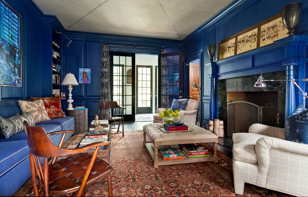 Inspiration for a classic living room in New York with blue walls and a stone fireplace surround.