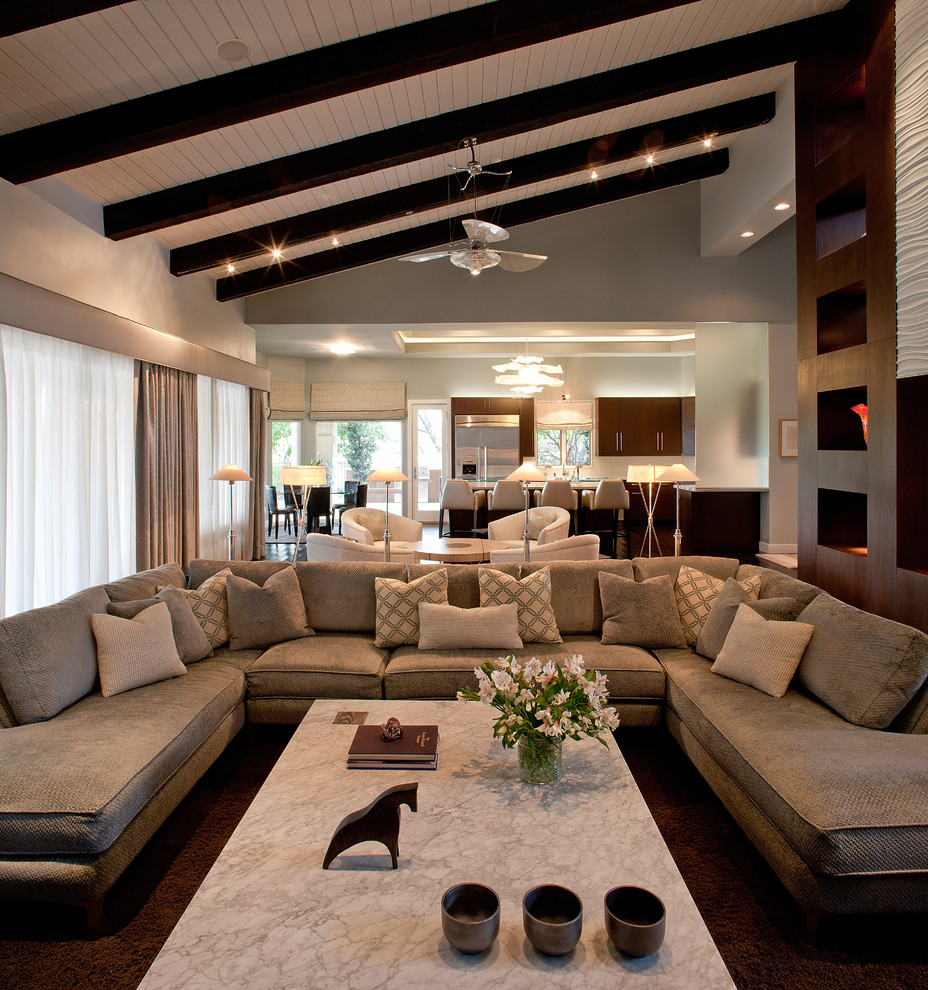 Contemporary living room in Phoenix with feature lighting.