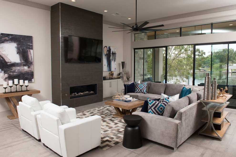 Inspiration for a large transitional open concept beige floor living room remodel in Austin with white walls, a ribbon fireplace, a tile fireplace and a wall-mounted tv