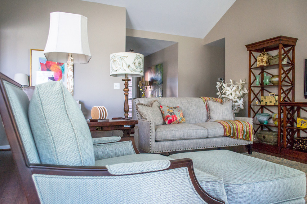 Living room - living room idea in Louisville with beige walls
