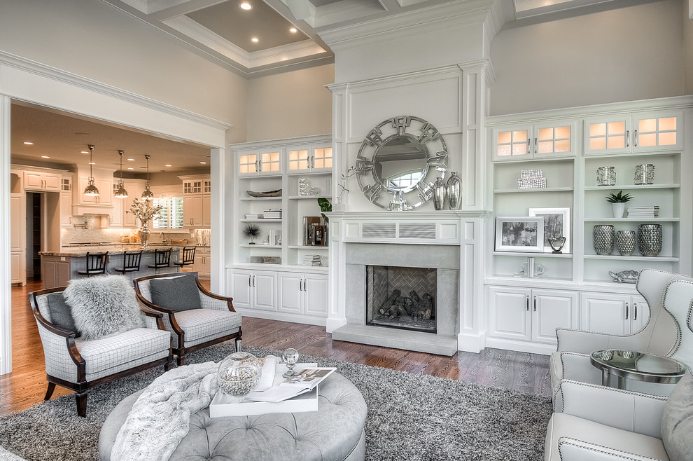 Living room - large traditional open concept dark wood floor living room idea in Salt Lake City with gray walls, a standard fireplace, a stone fireplace and no tv