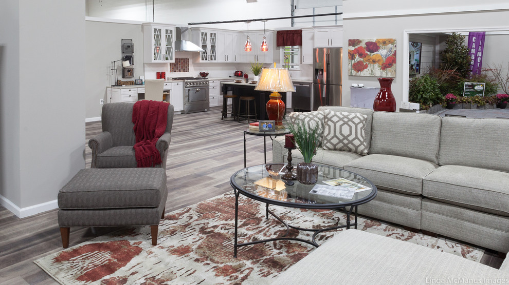 Medium sized classic open plan living room in Philadelphia with grey walls, light hardwood flooring, no fireplace, a freestanding tv and grey floors.