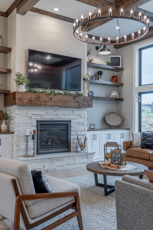 Fireplace Ideas With TV Above; Enjoy the warmth next to a burning fire
while watching your favorite movie or show with these living room ideas!