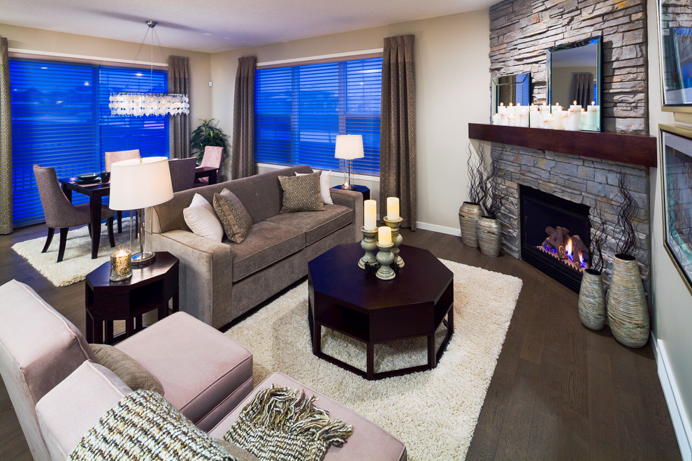 Trendy living room photo in Calgary with beige walls and a corner fireplace