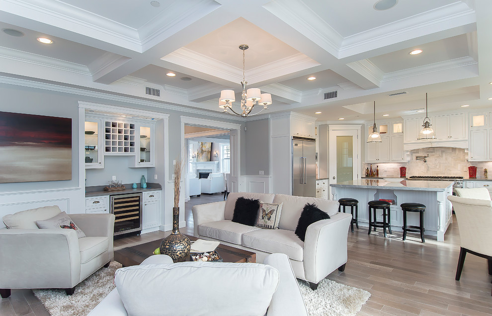 Inspiration for a timeless living room remodel in Los Angeles with a bar and gray walls
