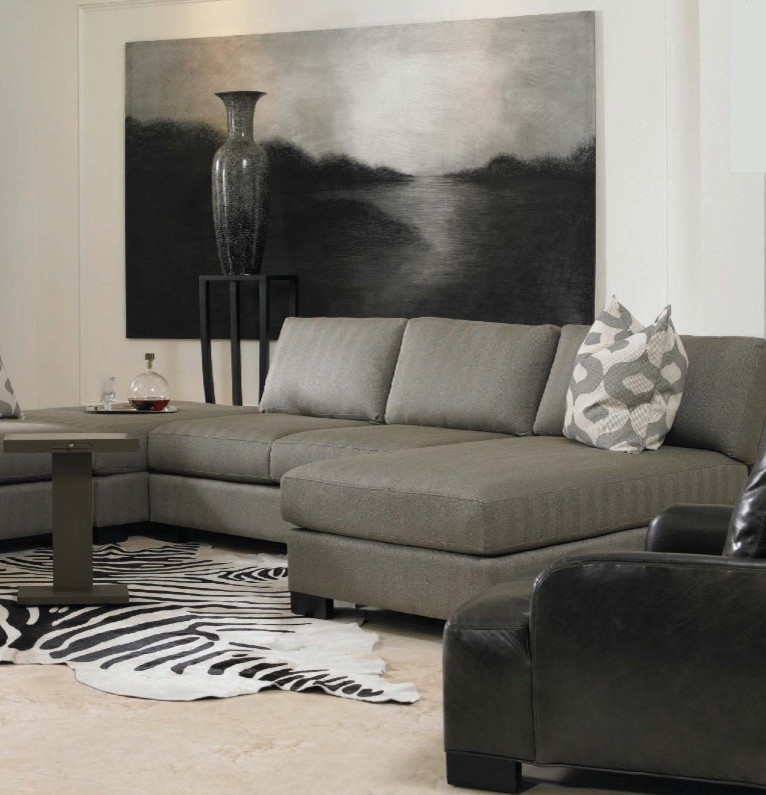 Photo of a modern living room in Denver with dark hardwood flooring and brown floors.