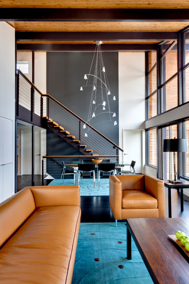 Repräsentatives Modernes Wohnzimmer mit grauer Wandfarbe in Sonstige