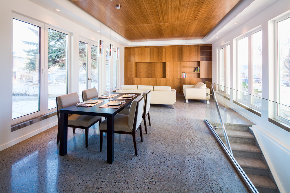 Offenes, Mittelgroßes, Repräsentatives, Fernseherloses Modernes Wohnzimmer ohne Kamin mit weißer Wandfarbe und Keramikboden in Calgary
