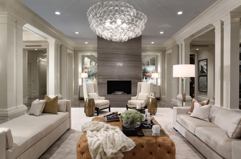 Expansive traditional living room in Miami with a standard fireplace and feature lighting.