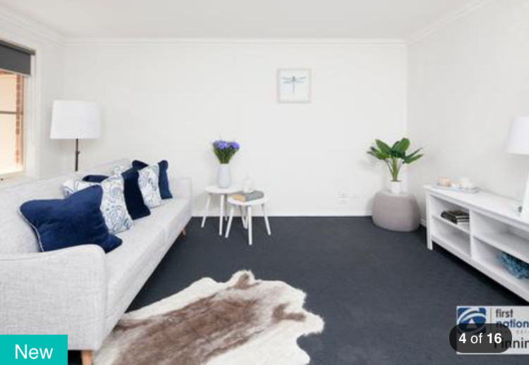 Beach style living room photo in Melbourne