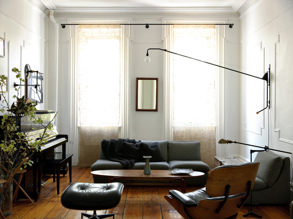 Ispirazione per un soggiorno minimal con pareti bianche