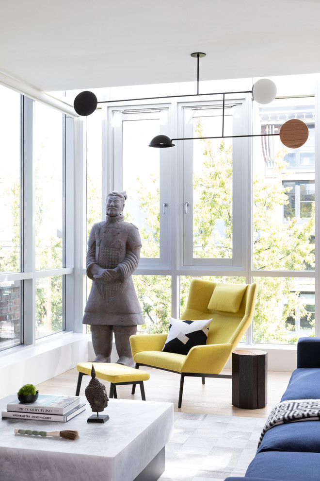 Large eclectic formal and open concept light wood floor and beige floor living room photo in Other with no fireplace, no tv and white walls