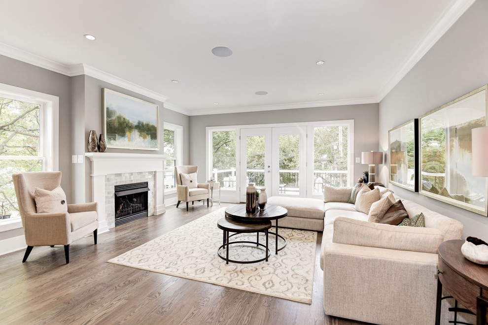 Example of a transitional formal dark wood floor and brown floor living room design in DC Metro with gray walls, a standard fireplace, a tile fireplace and no tv