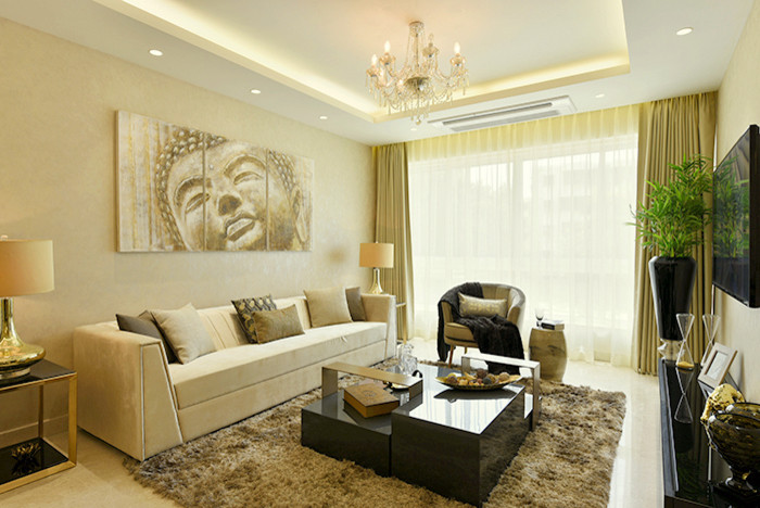 Design ideas for a medium sized contemporary formal living room in Mumbai with marble flooring and a wall mounted tv.