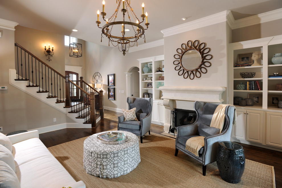 Inspiration for a classic formal and grey and cream open plan living room in Nashville with grey walls, dark hardwood flooring, a standard fireplace and no tv.