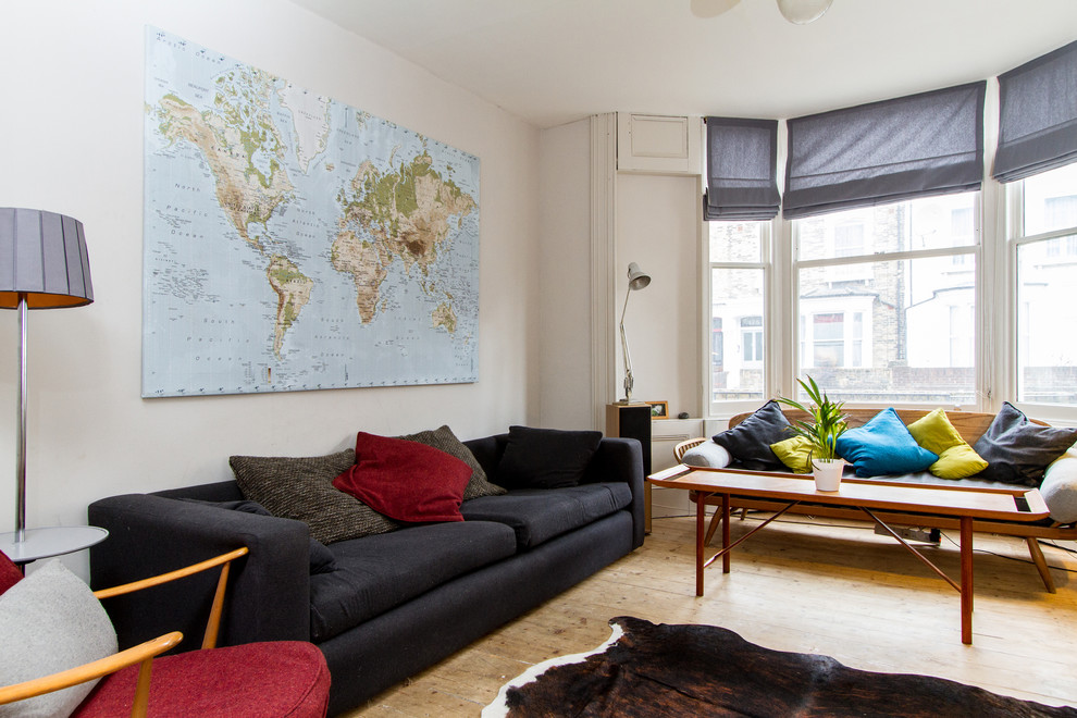 Midcentury living room in London with white walls.